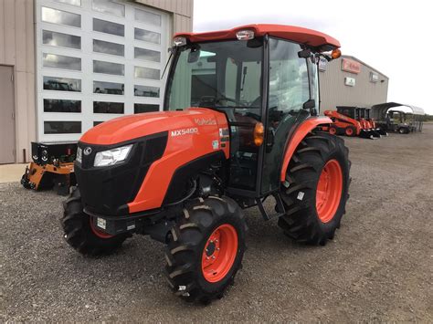 More Possibilities Combined with Implements. . Kubota mx5400 cab